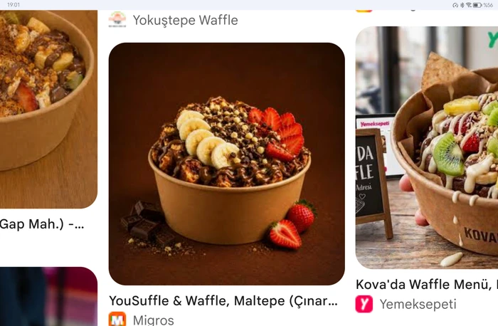 Classic waffle with milk chocolate, banana, strawberry, and hazelnut